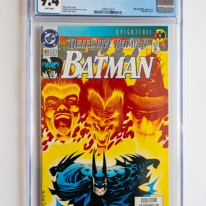 A batman comic book is displayed on the wall.